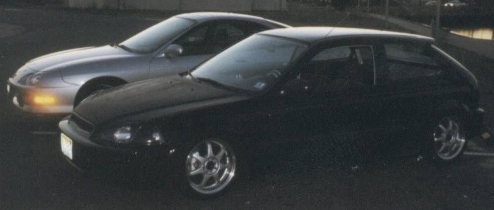 My car next to my friends 2001 GSR